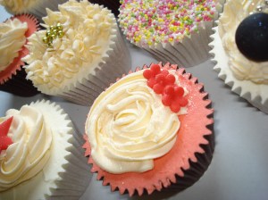 Ivory rose with red sugarcraft flowers