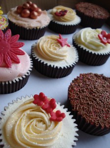 Rose swirl and dainty flowers cupcake