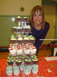 Lizzie with her Christmas cupcakes