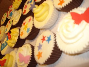 Rainbow coloured cupcakes