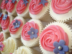 Pink rose swirls and purple flower