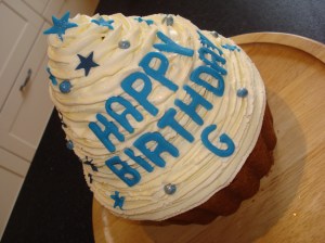 Giant boys birthday cupcake