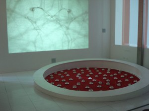 Tea cups filled with a Hendricks Pot-tail