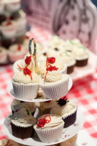 Red string decorated cupcakes
