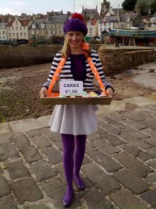 Dressed up walking the streets of Pittenweem selling cupcakies!