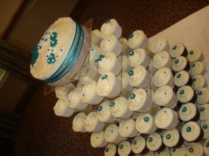 Cupcakes with raspberry giant cupcake as top tier