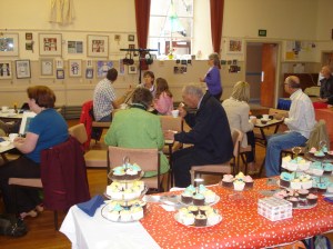 Festival goers enjoying tea and cake!