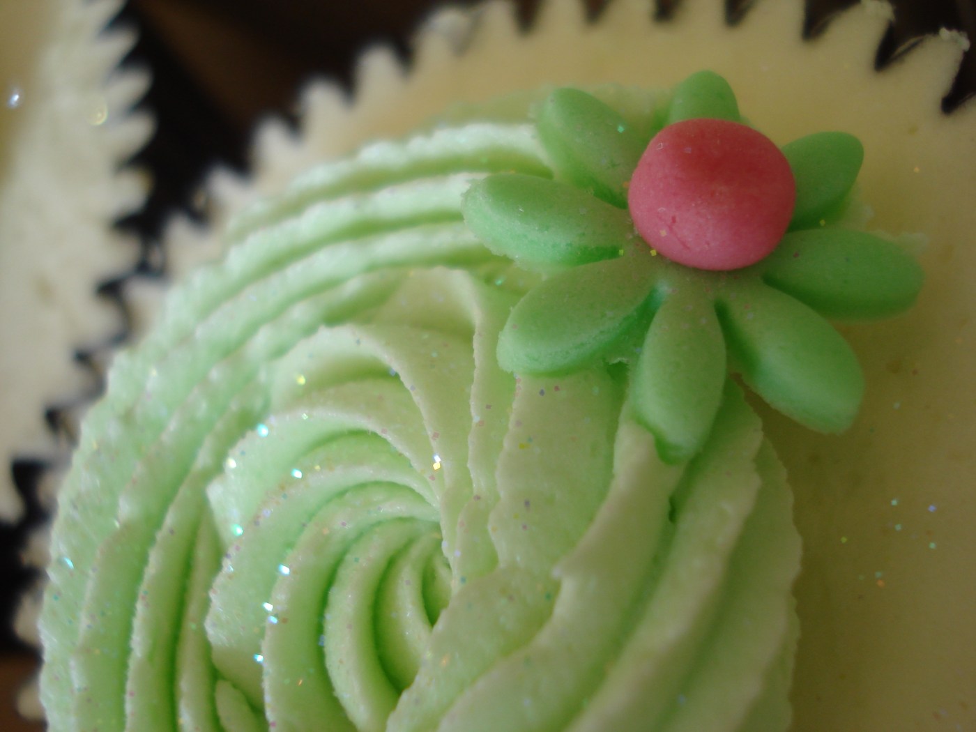 Pretty green flower on icing swirl